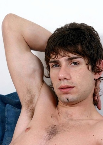 Shaggy haired young college guy with hairy pits