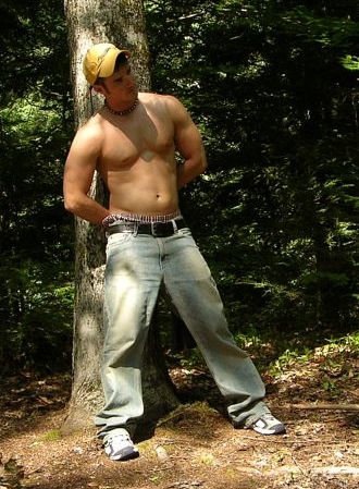Hunky muscle jock gets his picture taken
