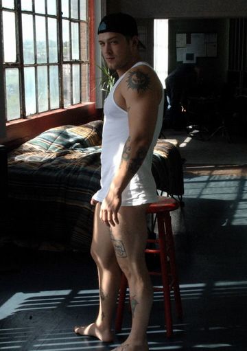 Built jock stud with ink in wifebeater