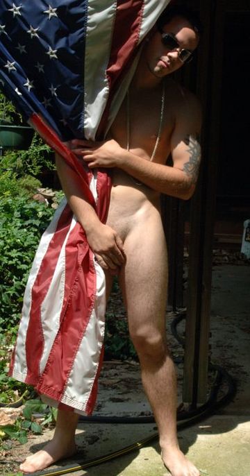 HOt Straight guy covers cock and covers himself with the american flag. 