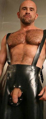Furry stud shows his erect nipples and big dick