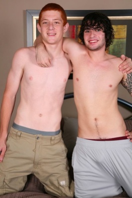 Pale twink and skater boy shirtless on bed