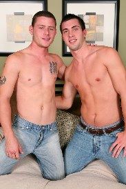 Shirtless young jocks on bed