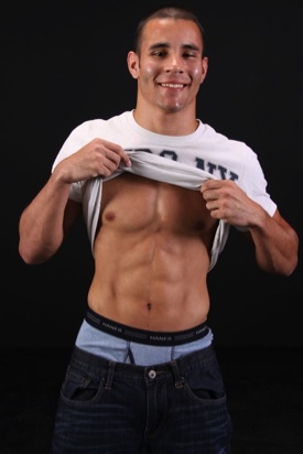 Smooth young jock shows off his abs