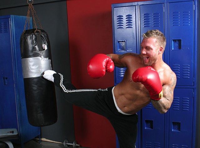 Bo Dean kickboxes in the gym