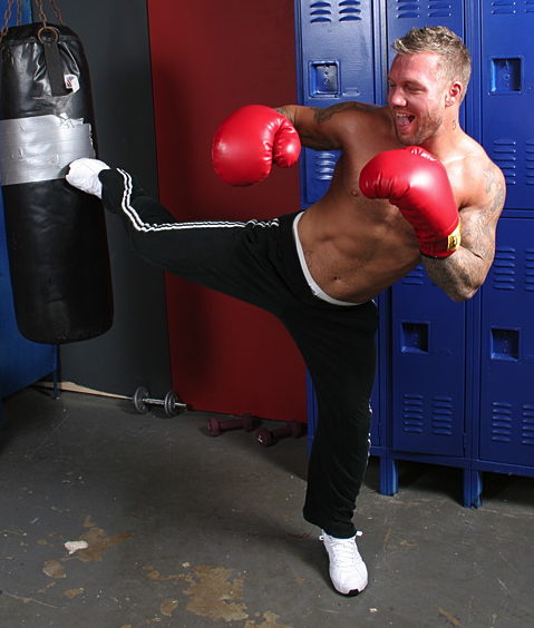 Bo Dean kickboxes in the gym