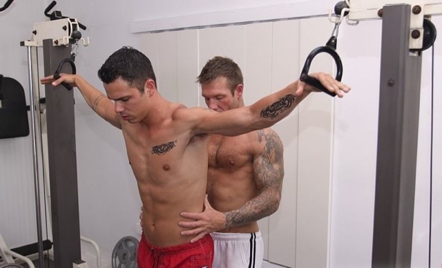 Muscled Bo helps train young Tyler in the gym