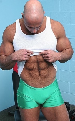 Bald stud shows off his furry abs