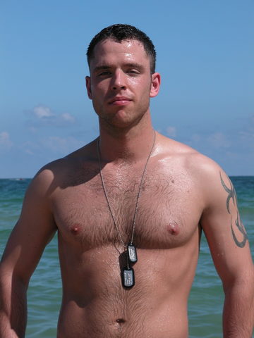Hot hairy young soldier in the ocean