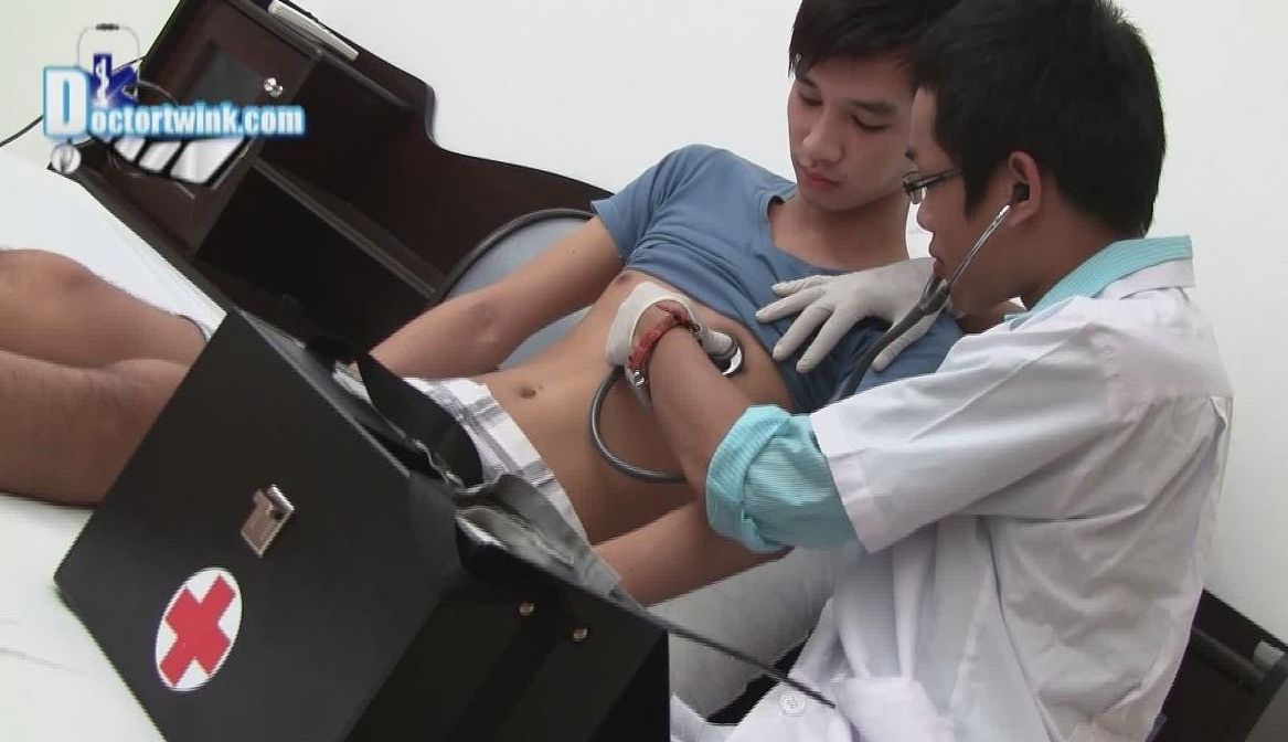 Young Asian doctor examines his patient