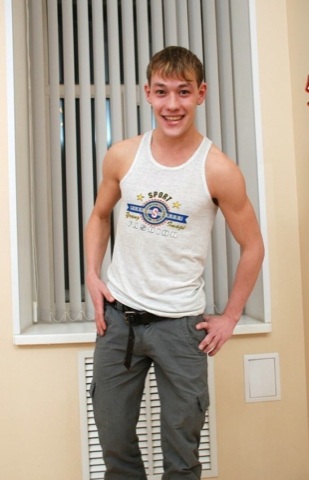 Hot young blond jock in a tank top