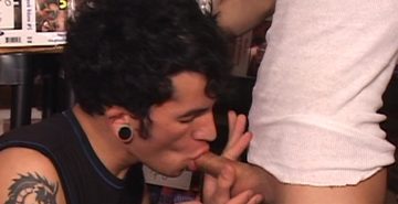 Pierced and inked twink sucking cock