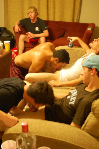Two frat boys on their knees sucking dick
