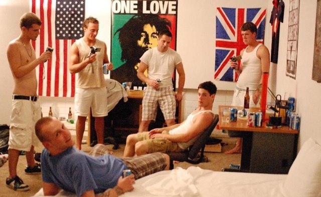 Room of hot young frat boys drinking