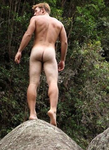 Cute jock naked on a rock