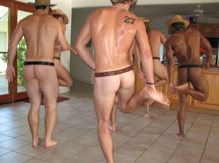 Naked guys line dancing (poorly)