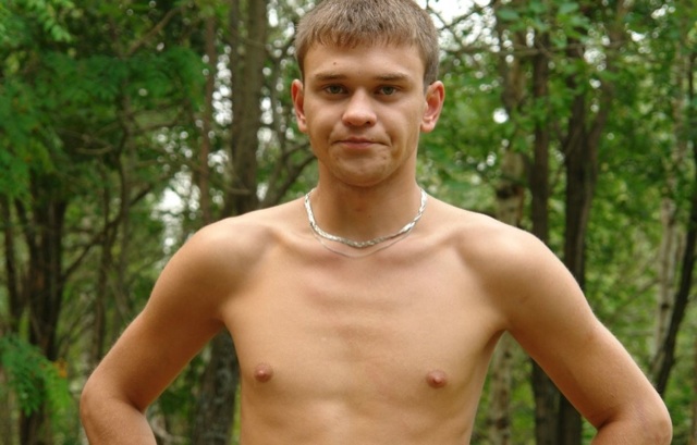 Skinny shirtless twink outdoors