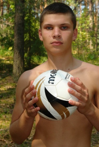 Young hairless twink with soccer ball