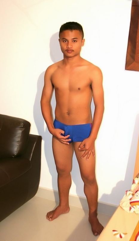 Young Asian twink plays with his crotch in his underwear
