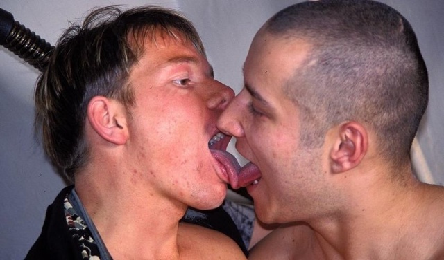 Young jocks swap tongue spit
