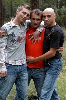 Three cute young guys before playing around