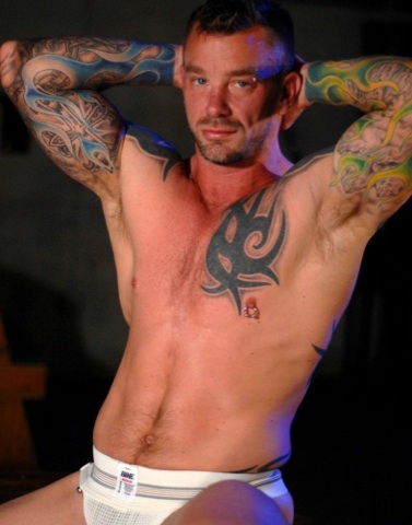 tattooed and pierced, showing armpits