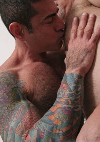 Inked daddy Nick Moretti plays with Jake Cruise\'s chest
