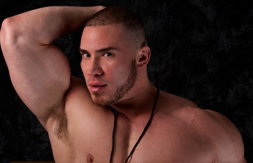 Angelo shows off his hairy pit and bicep