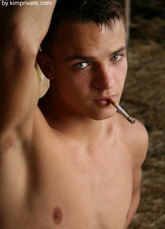 Innocence lost - hot young boi smoking a cigarette