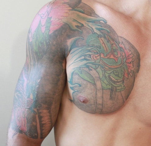 Young jock\'s smooth chest and ink