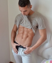 Latin jock shows off his ripped abs