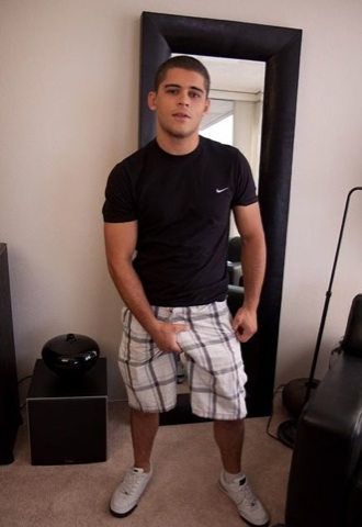 Hot young jock Latino holds his bulge