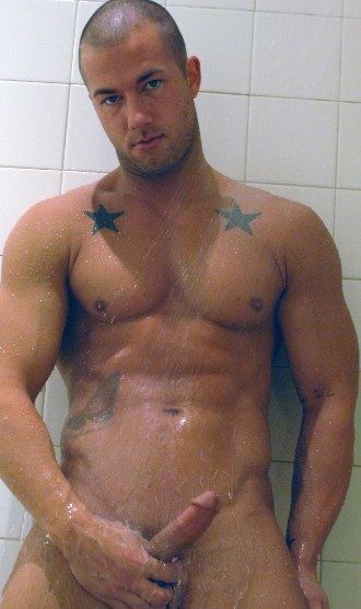 Rod Dialy grips big dick in shower. 