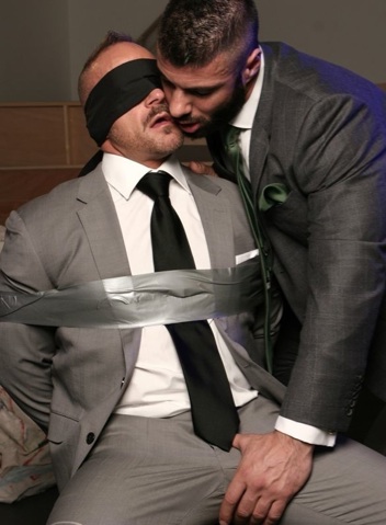 Alex gropes blindfolded and restrained Samuel\'s fat cock