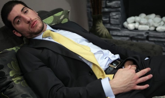 Scruffy Leo Domenico plays with his foreskin dressed in his suit