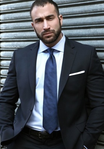 Suited muscle stud Spencer Reed