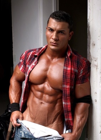 Omar Fabrouk\'s huge chest and ripped abs