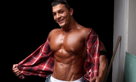 Omar strips off his shirt to show off his huge chest