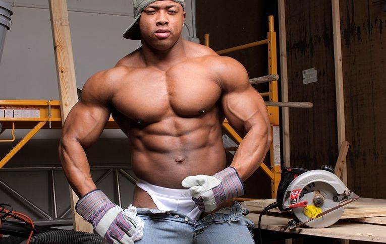 Massive bodybuilder Ron Hamilton shows off his chest and arms