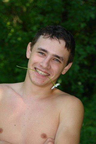 Cute smiling shirtless 19 year old twink