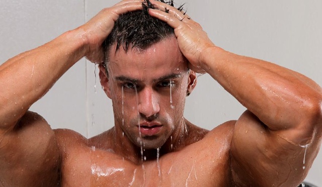 Hot young bodybuilder dripping wet