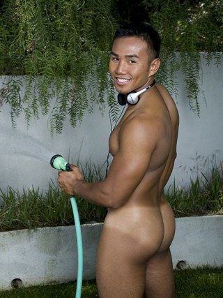Smooth muscled Asian boy with tan line