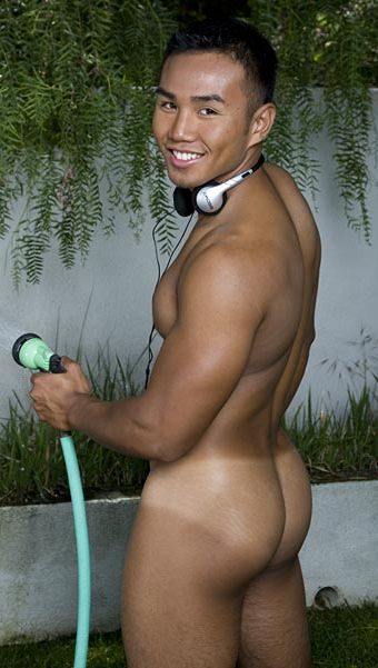 Smooth muscled Asian boy with tan line