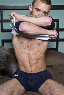 Hot furry stud takes his shirt off