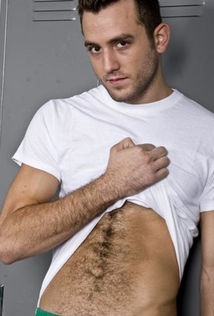 Furry chested hunk shows his sexy stomach