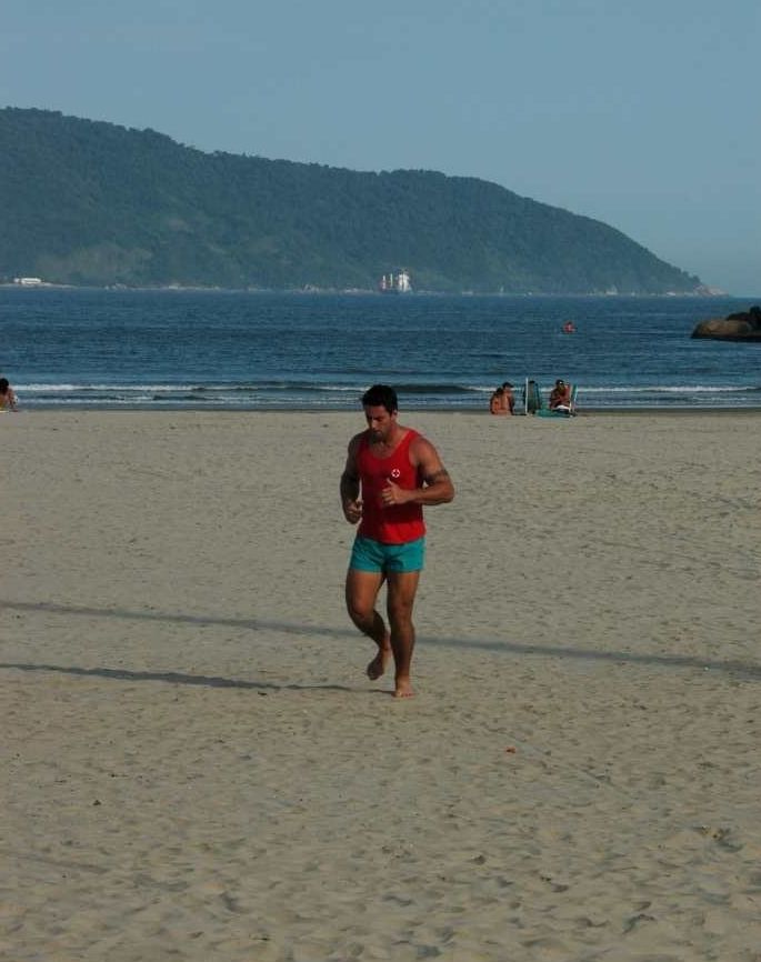 Ricardo Caffe jogging on the beach