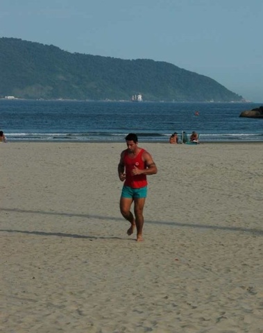 Ricardo Caffe jogging on the beach