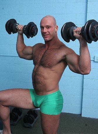 Muscle bear lifting weights