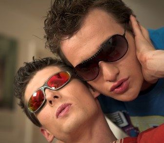 Two hot guys in sunglasses