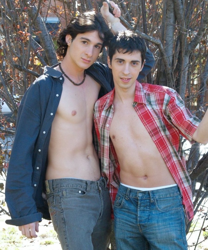 Young jock and twink hanging out with shirts open